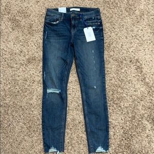 Mid Rise Ripped Dark Skinny Jean